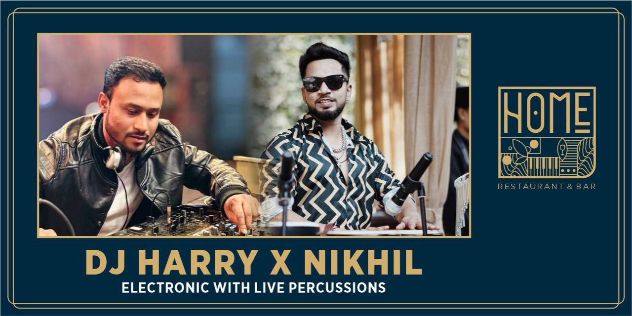 DJ Harry and DJ Nikhil performing a live electronic music set with percussion on stage