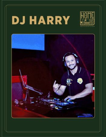 DJ Harry performing with high-energy beats in a vibrant late-night nightlife setting
